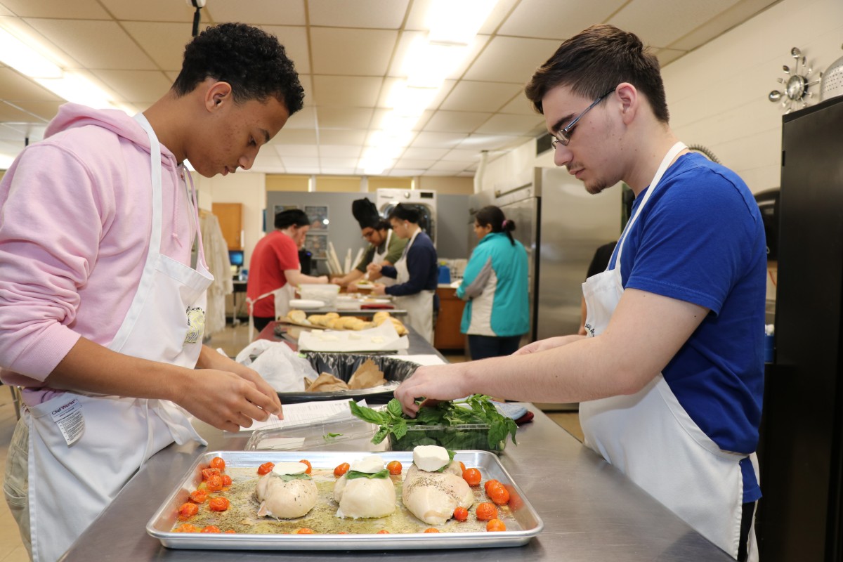 Students preparing a meal.