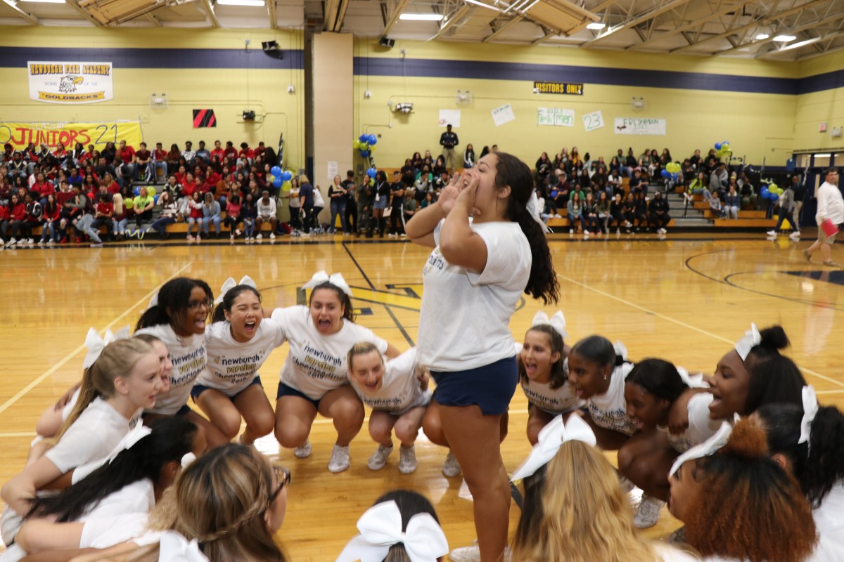 NFA Cheerleaders doing a cheer.