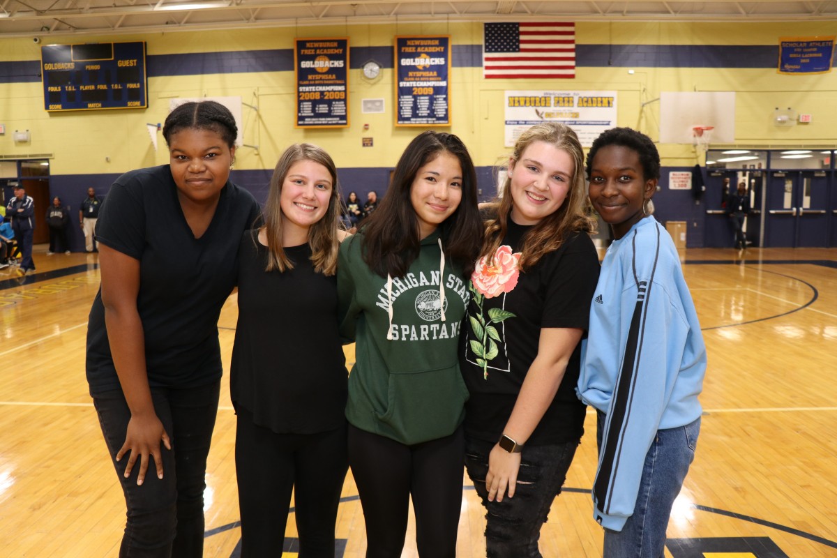 NFA Girls Tennis team poses for a photo.