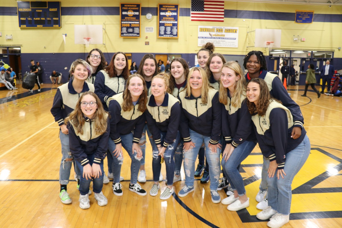 NFA Girls Swim team pose for a photo.