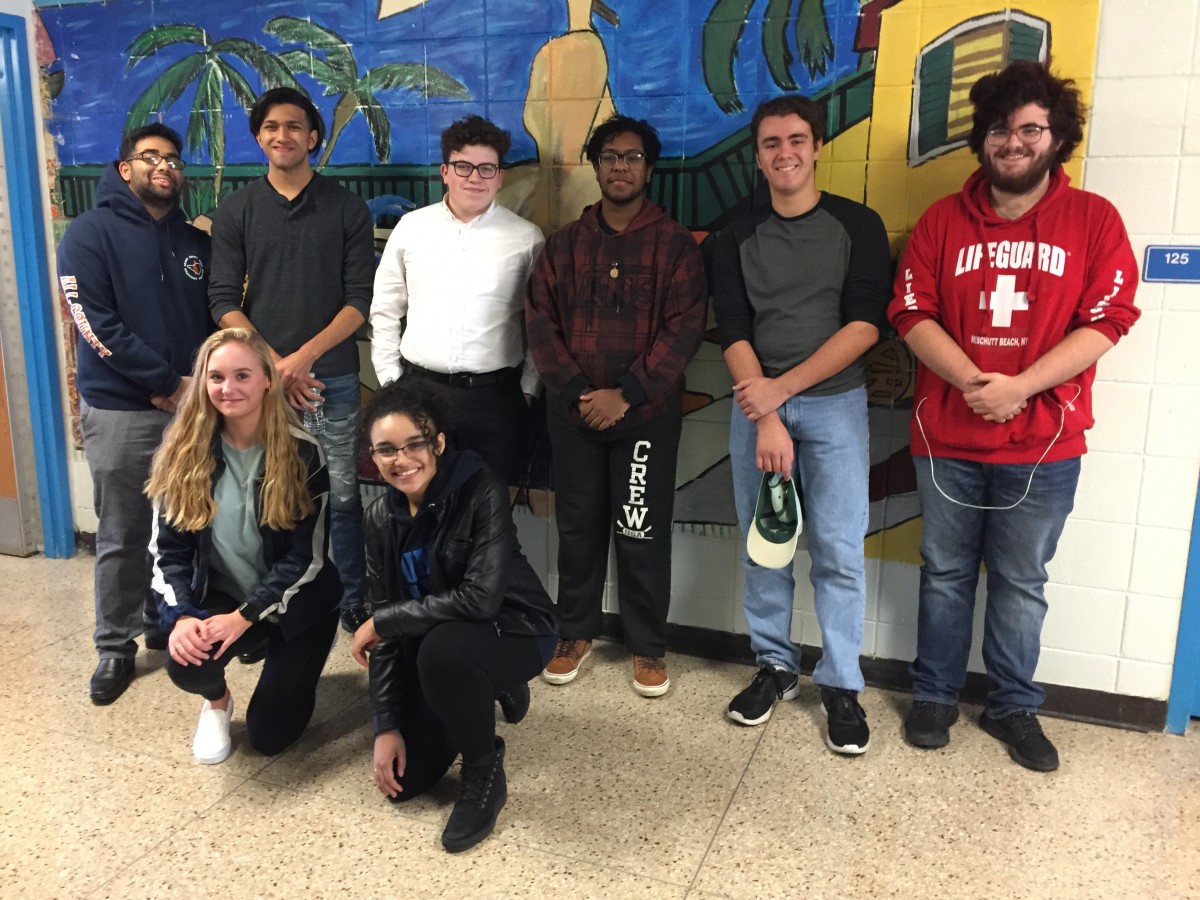 Scholars pose for a photo.