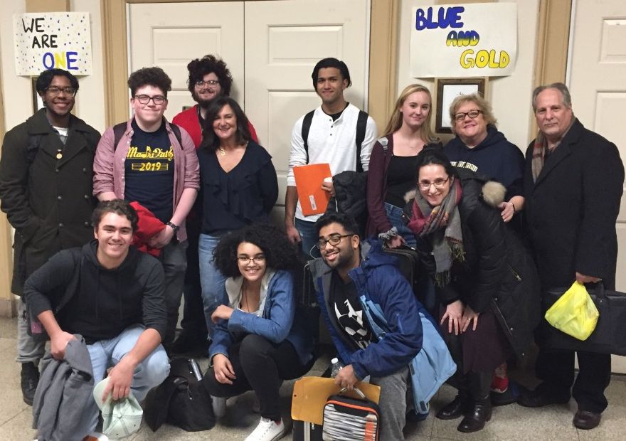 Scholars, their teachers, and assistant principal pose for a photo.