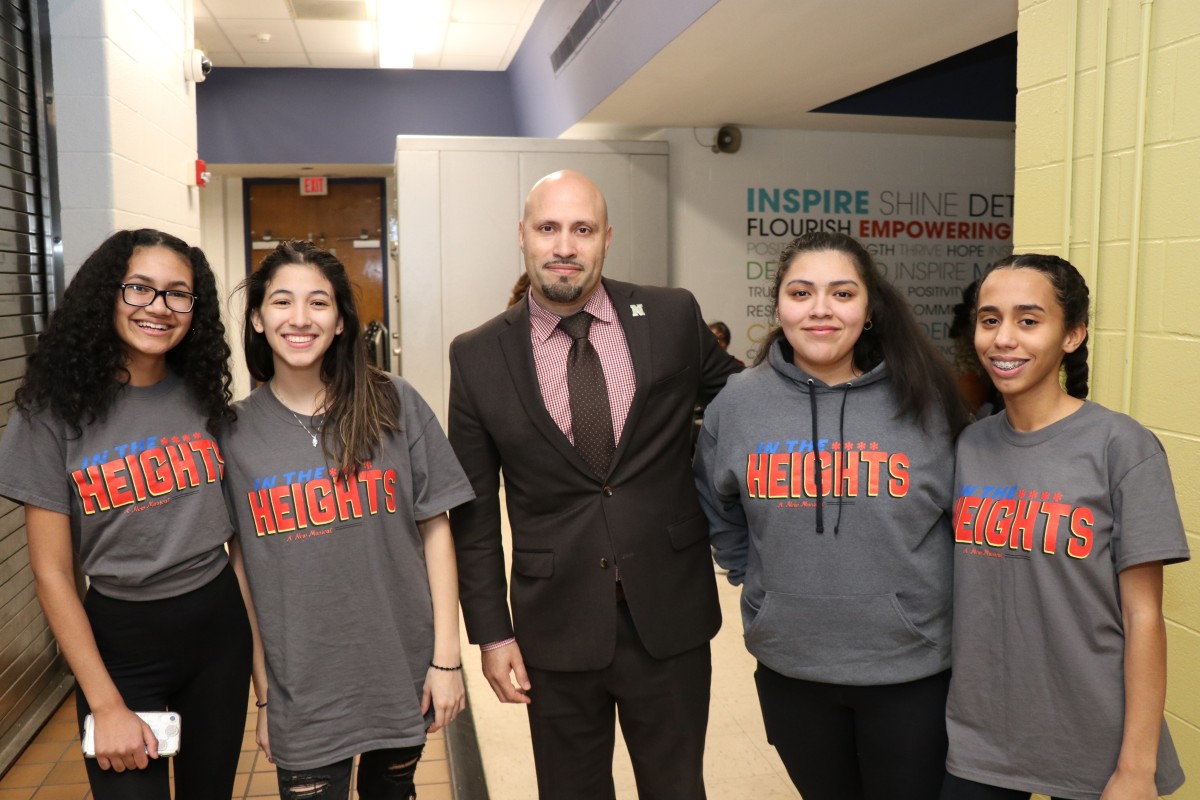 Cast and crew members of In the Heights pose for a photo with Superintendent Dr. Padilla.