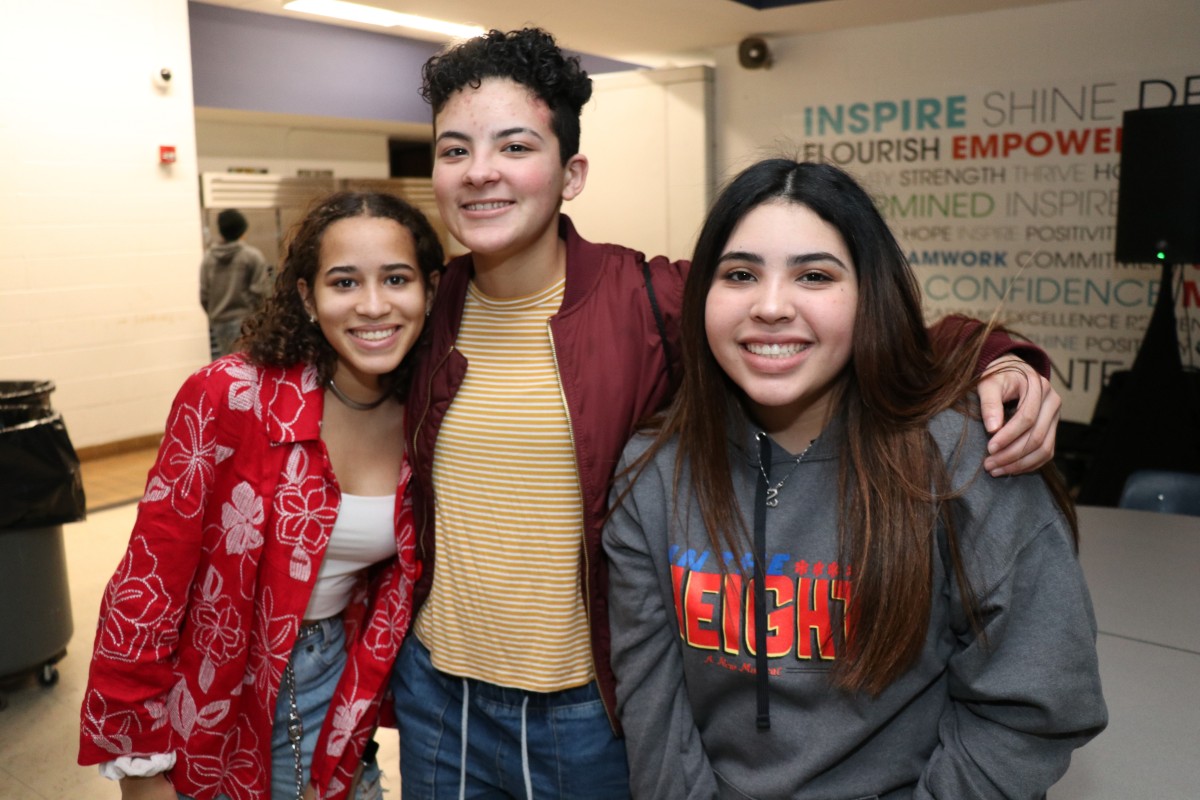 Cast and crew members of In the Heights pose for a photo