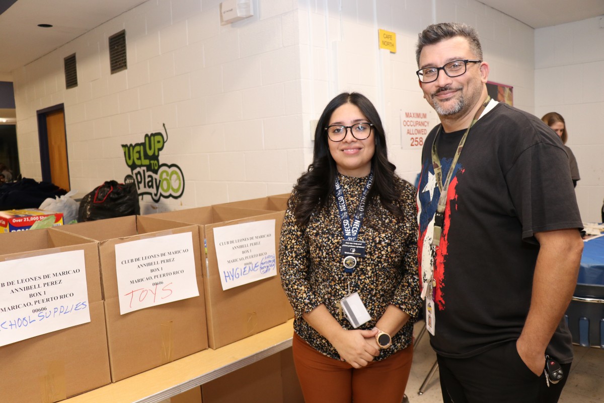 Ms. Laura Garcia and Mr. Roberto Cruz pose for a photo.