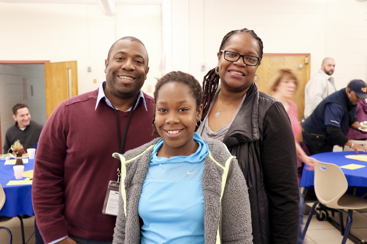 Family enjoys Pasta with the Principal