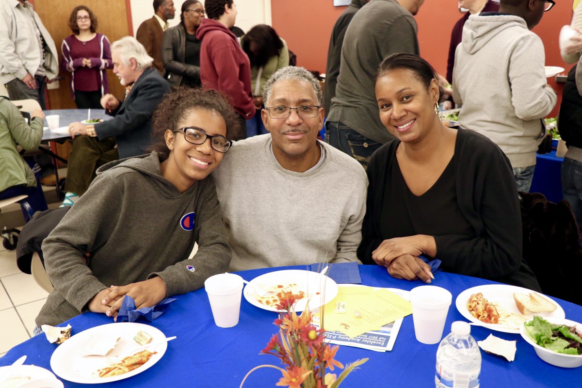 Family enjoys Pasta with the Principal