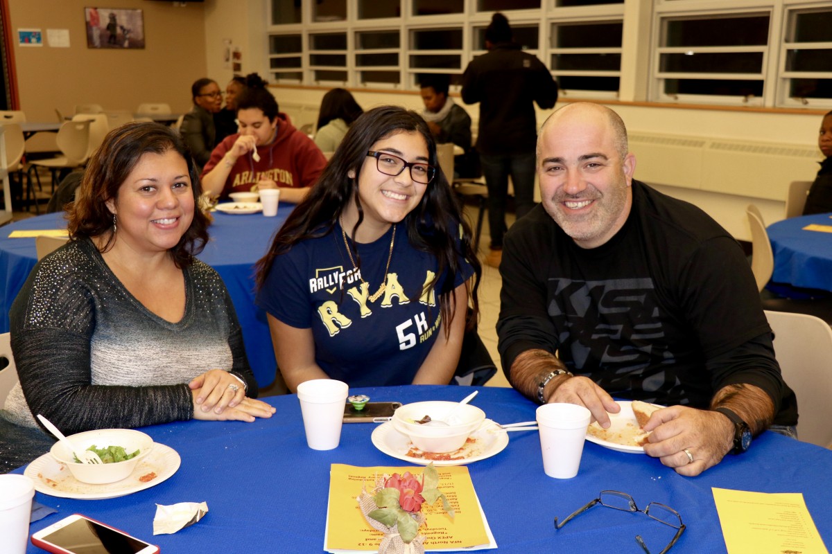 Family enjoys Pasta with the Principal