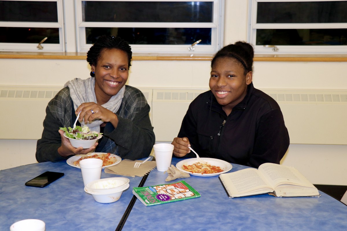 Family enjoys Pasta with the Principal