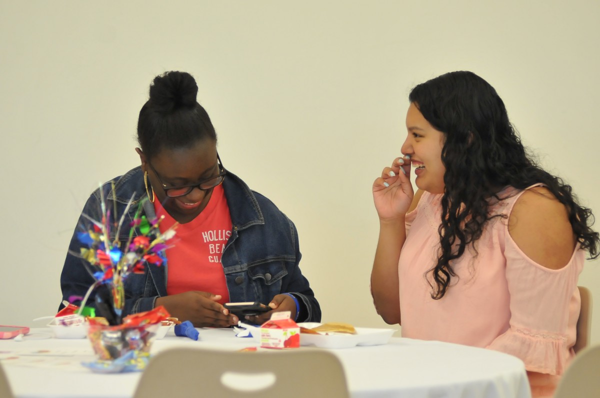 Student enjoying breakfast.