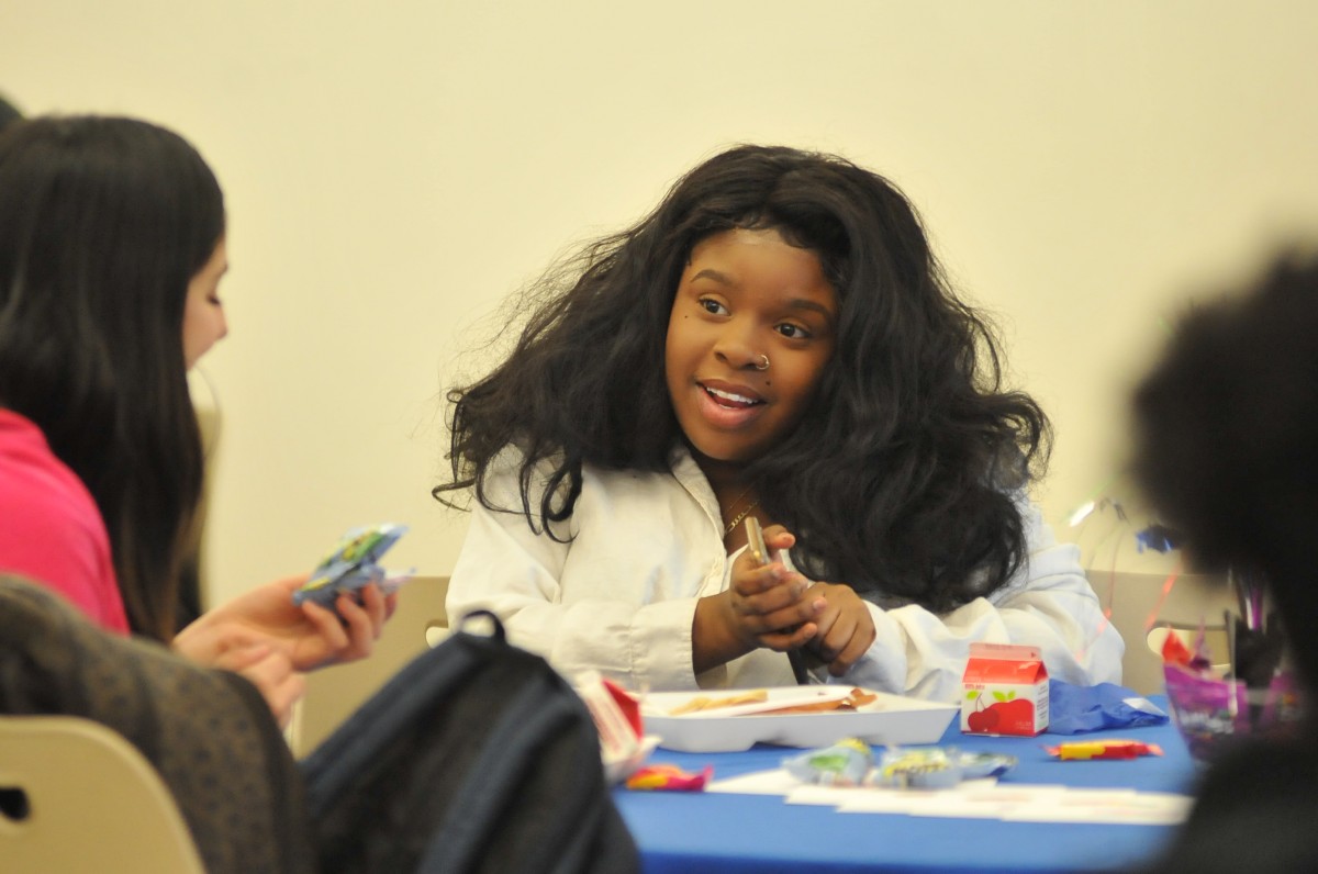 Student enjoying breakfast.