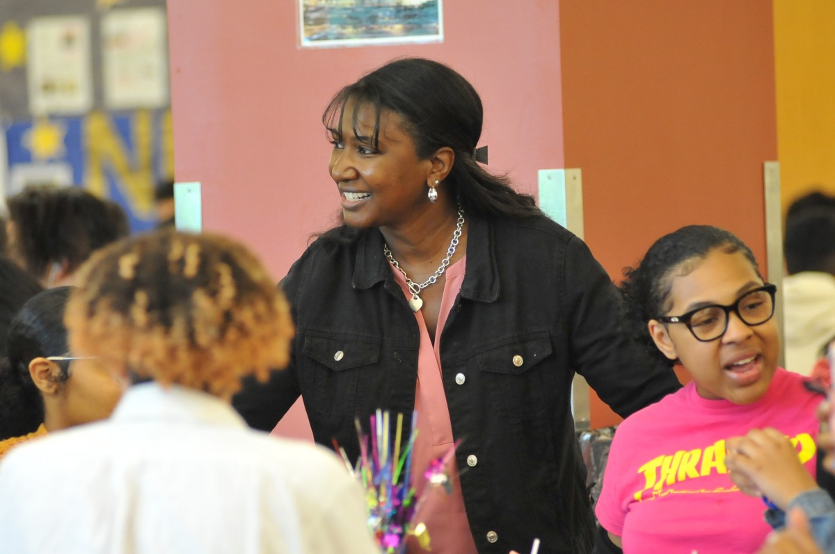 School counselor talking with students.