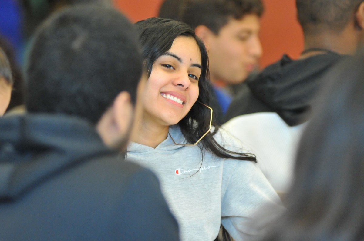 Student enjoying breakfast.