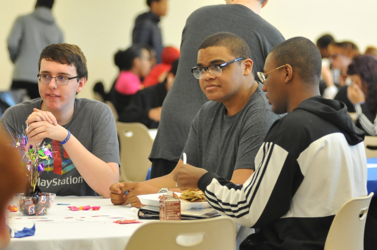 Student enjoying breakfast.