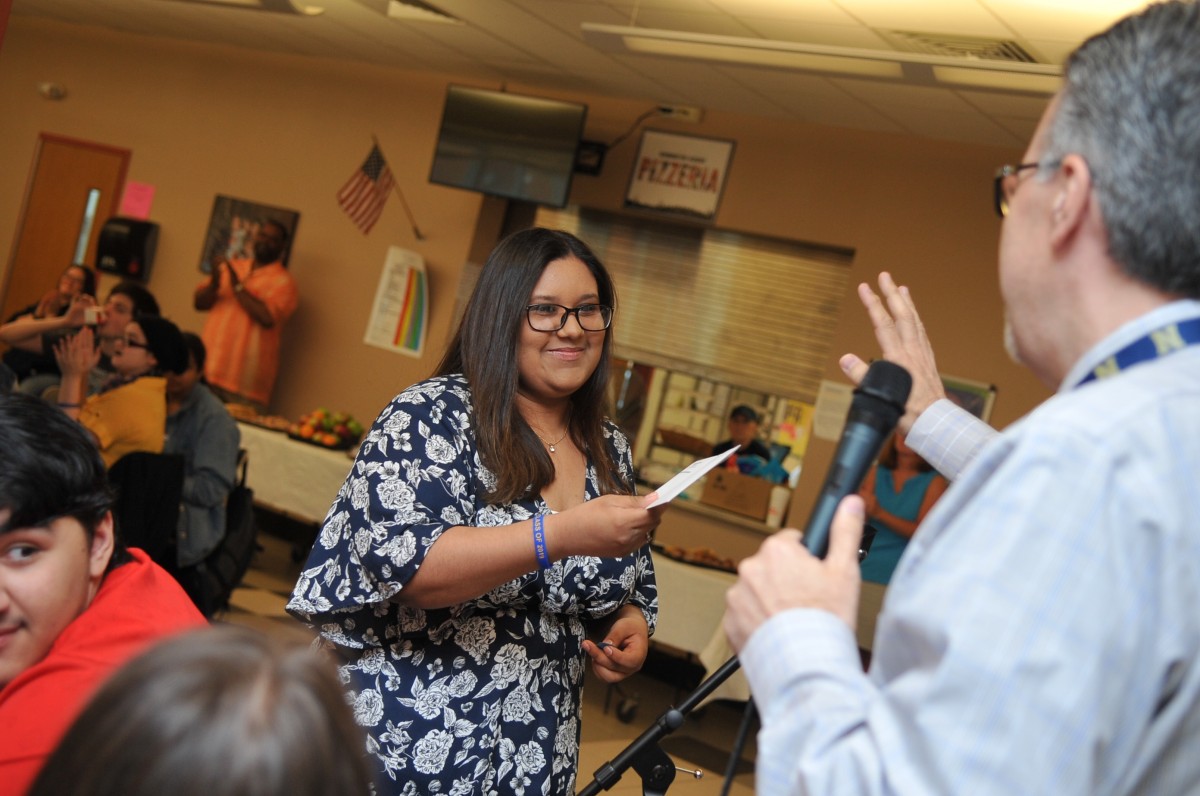 Student winning a prize.