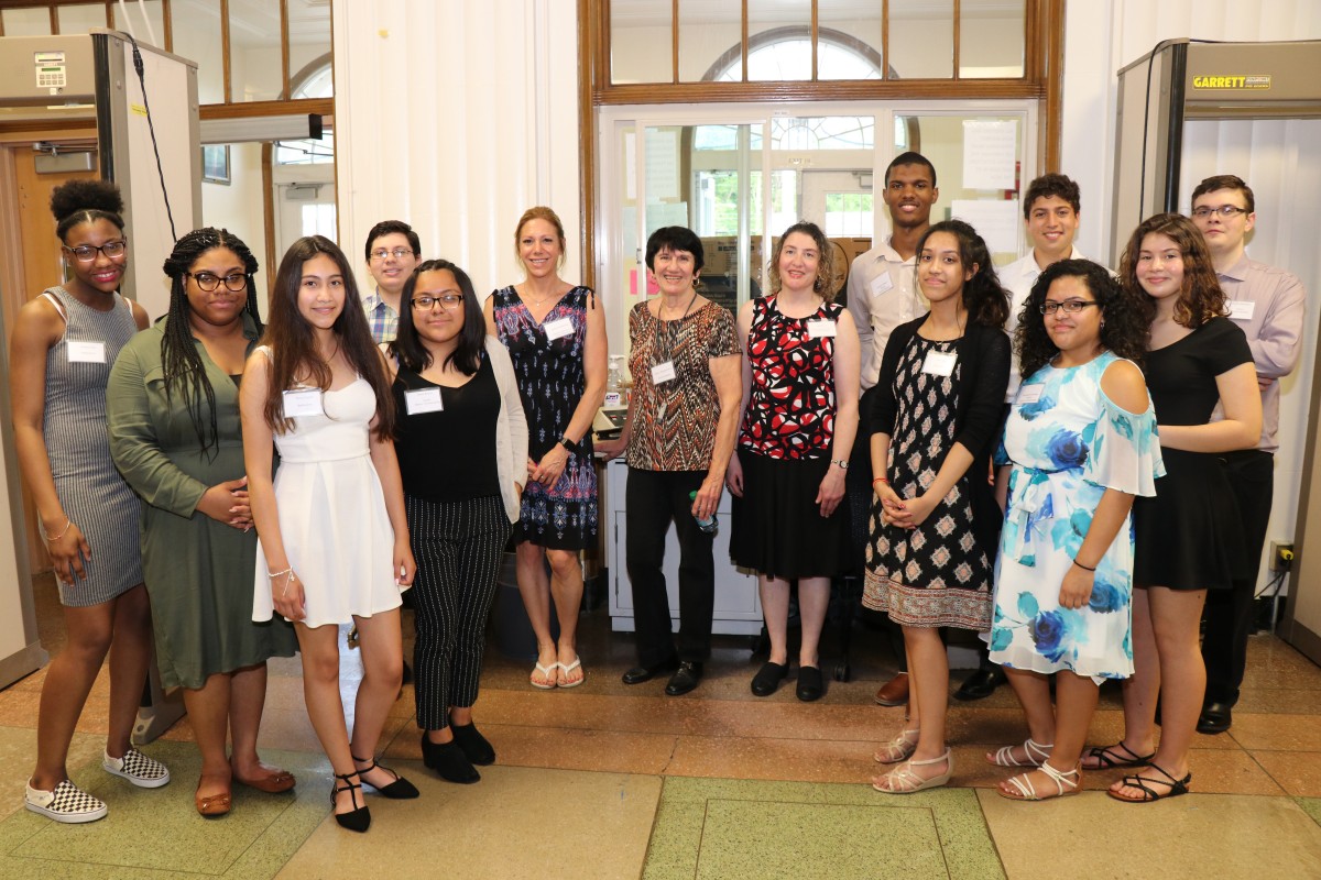 Student presenters, keynote speaker, and advisors pose for a group photo.