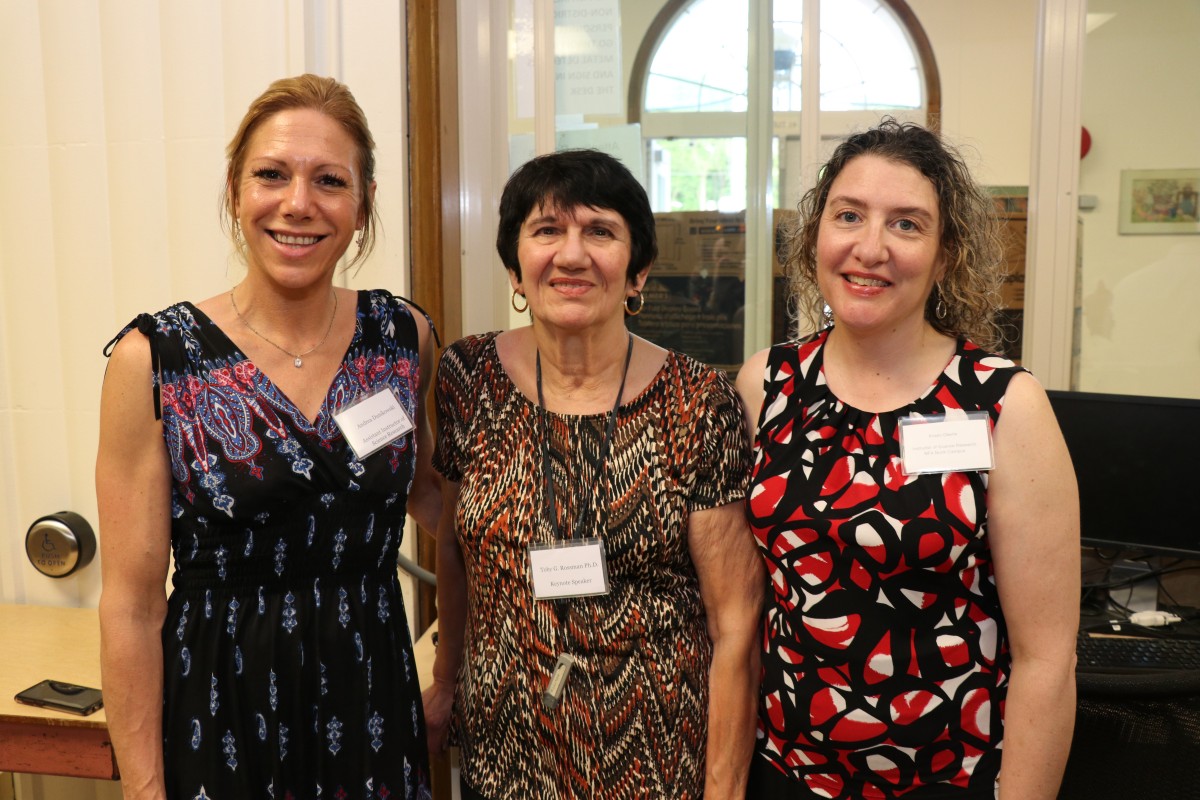 Teachers, Ms. Kristin Oberle and Ms. Andrea Dunikowski stand with keynote speaker and pose for a photo.