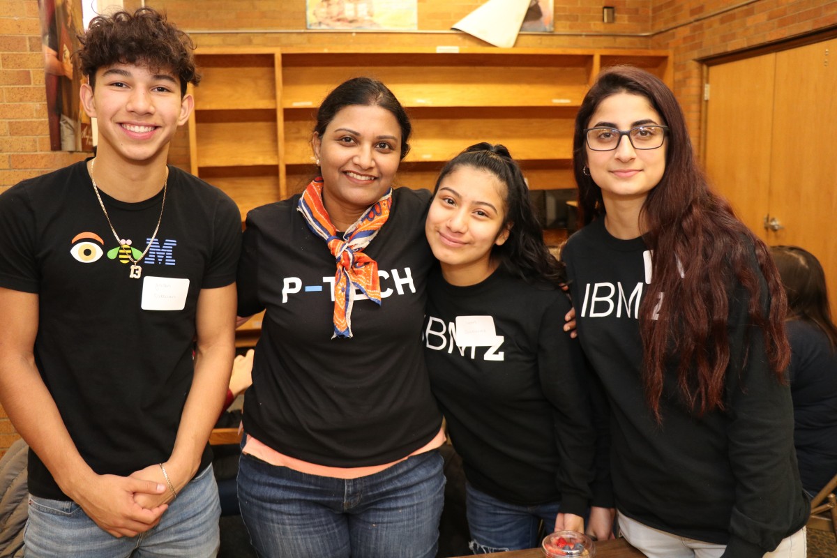 NFA P-TECH scholars pose for a photo with their IBM mentor.