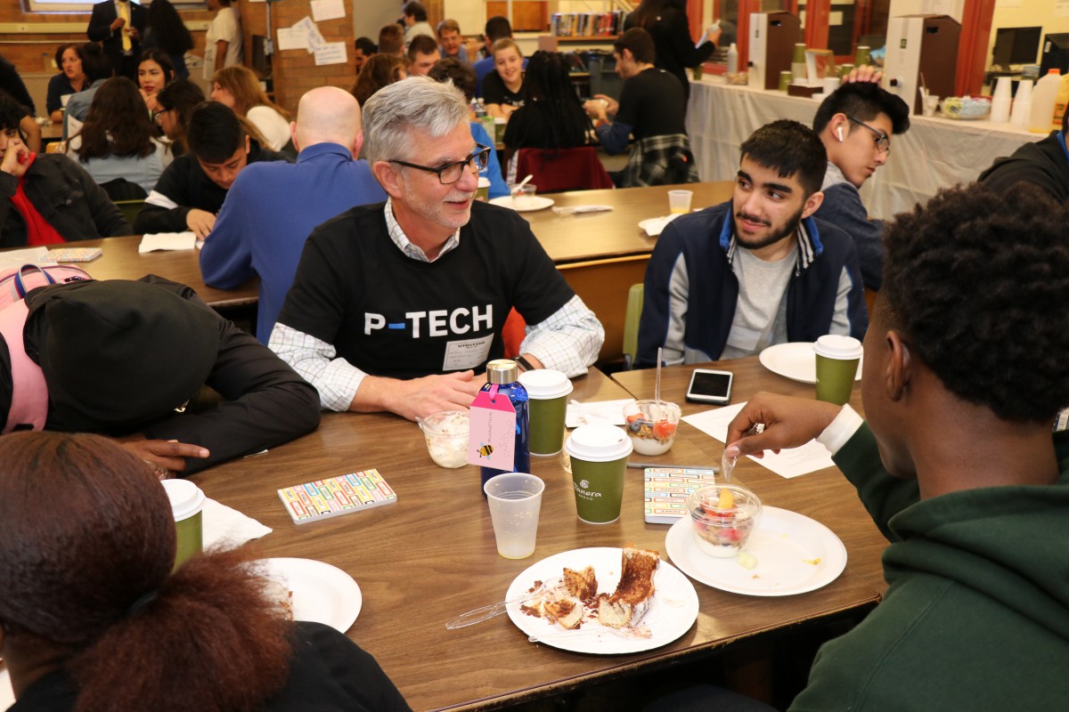 NFA P-TECH scholars pose for a photo with their IBM mentor.