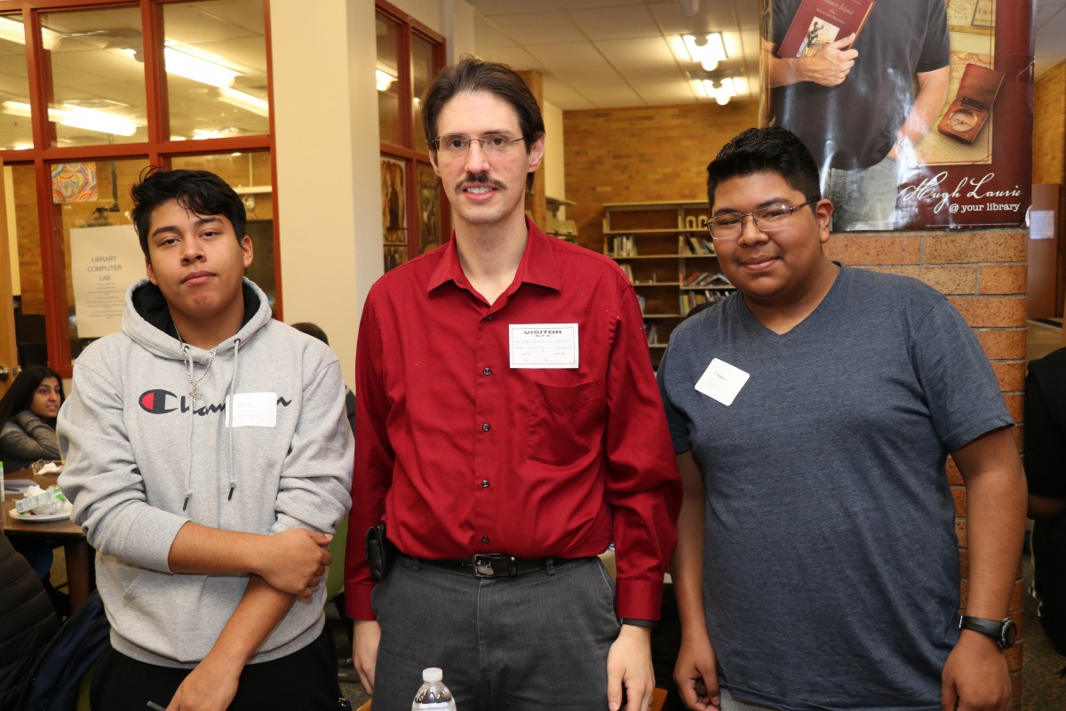 NFA P-TECH scholars pose for a photo with their IBM mentor.