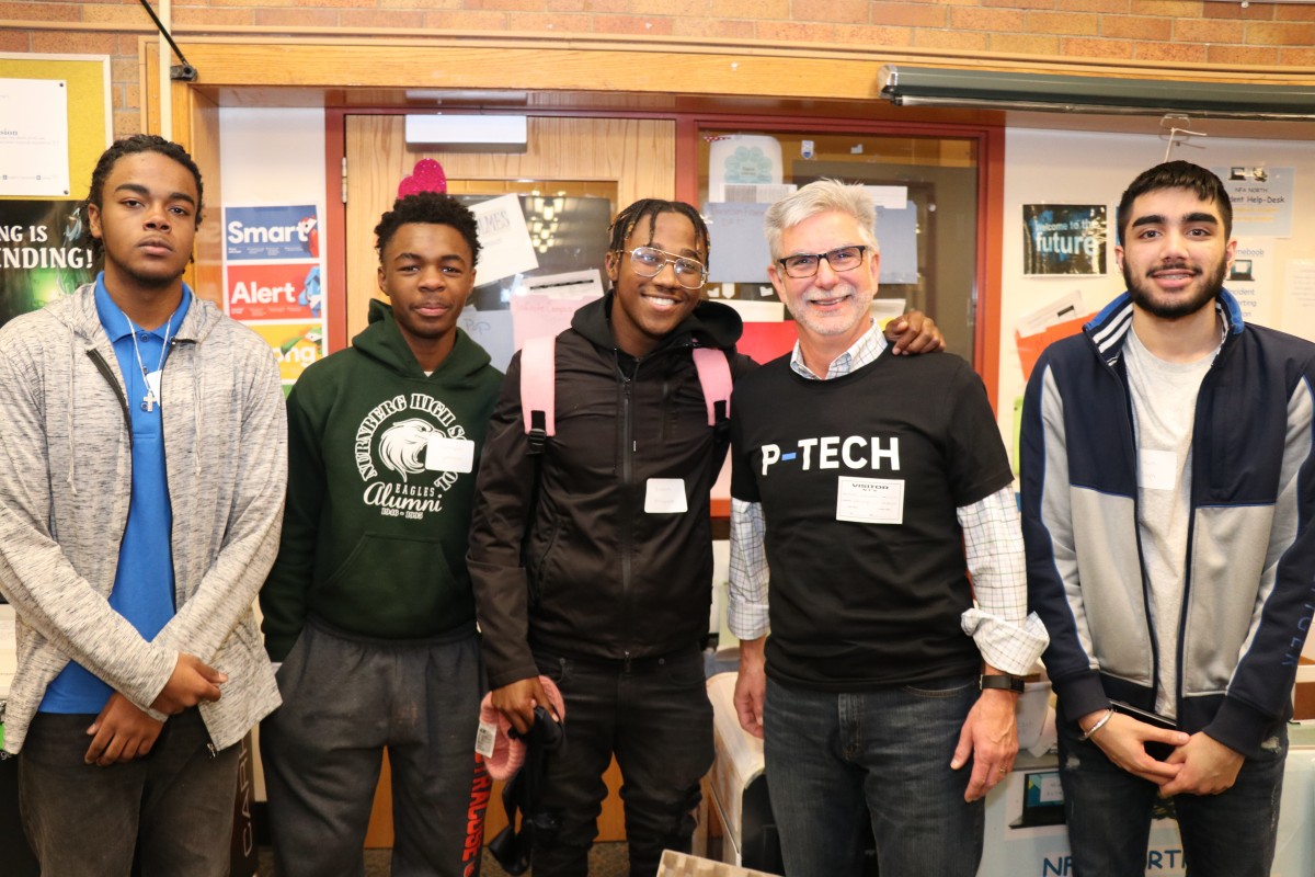 NFA P-TECH scholars pose for a photo with their IBM mentor.