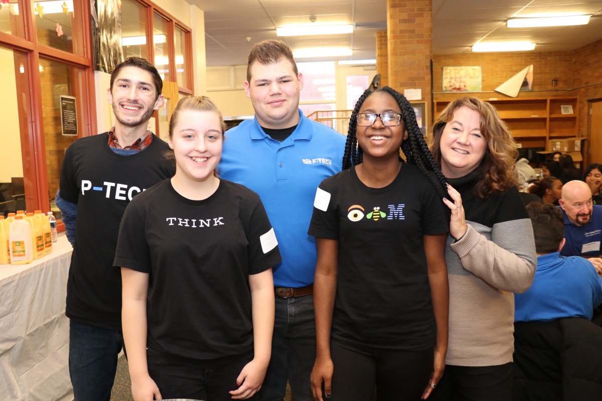 NFA P-TECH scholars pose for a photo with their IBM mentor.