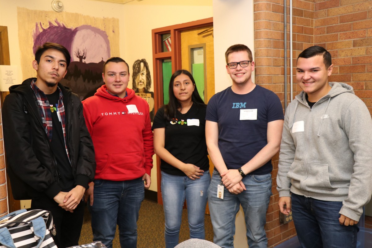 NFA P-TECH scholars pose for a photo with their IBM mentor.