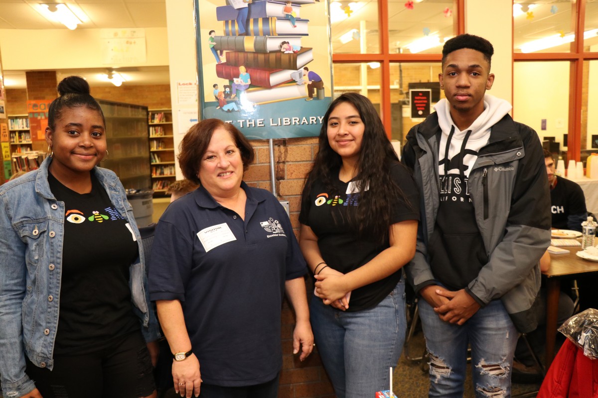 NFA P-TECH scholars pose for a photo with their IBM mentor.