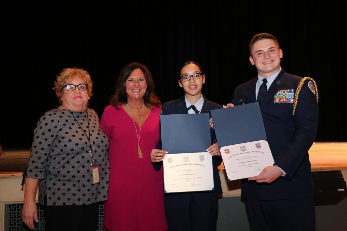 Students pose with their award.