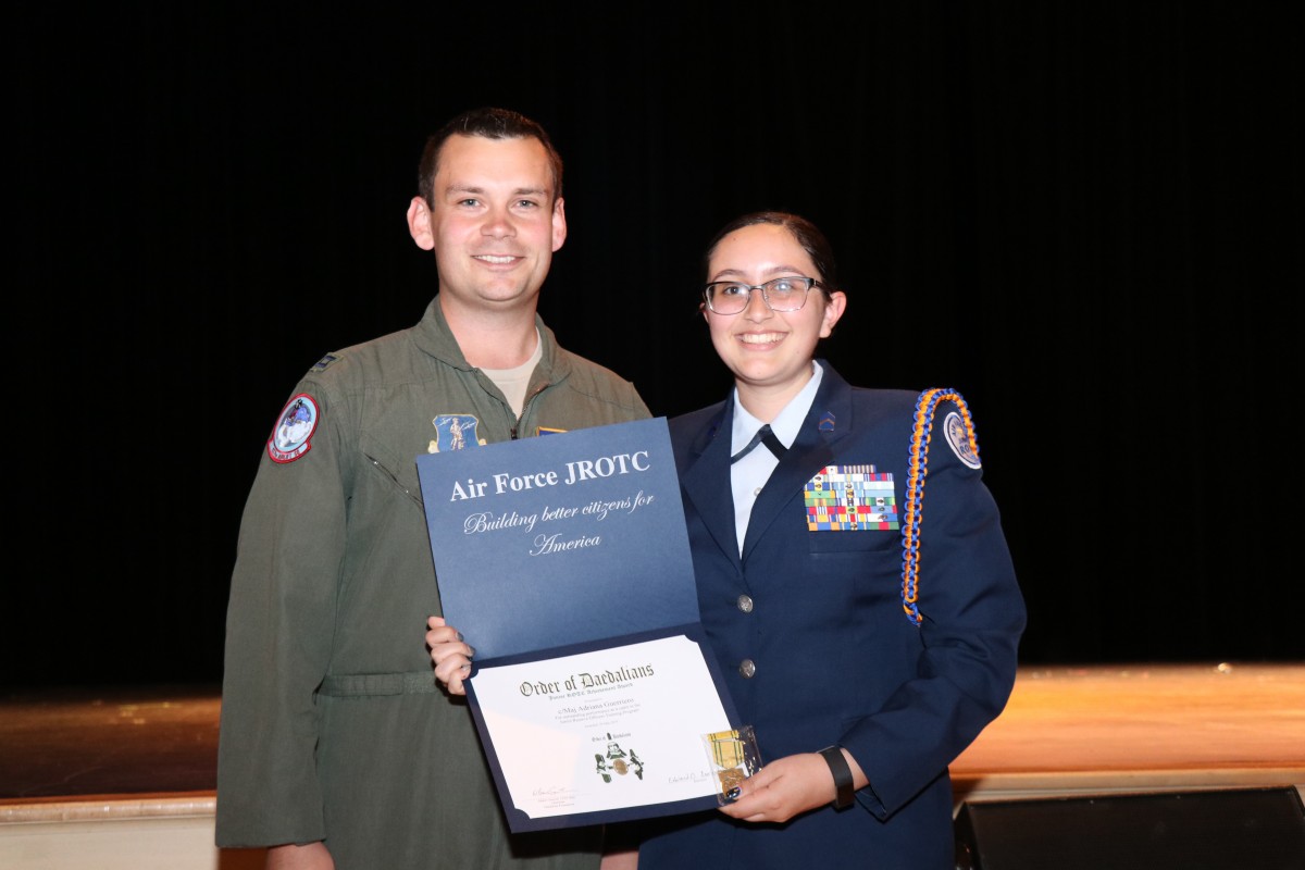 Students pose with their award.