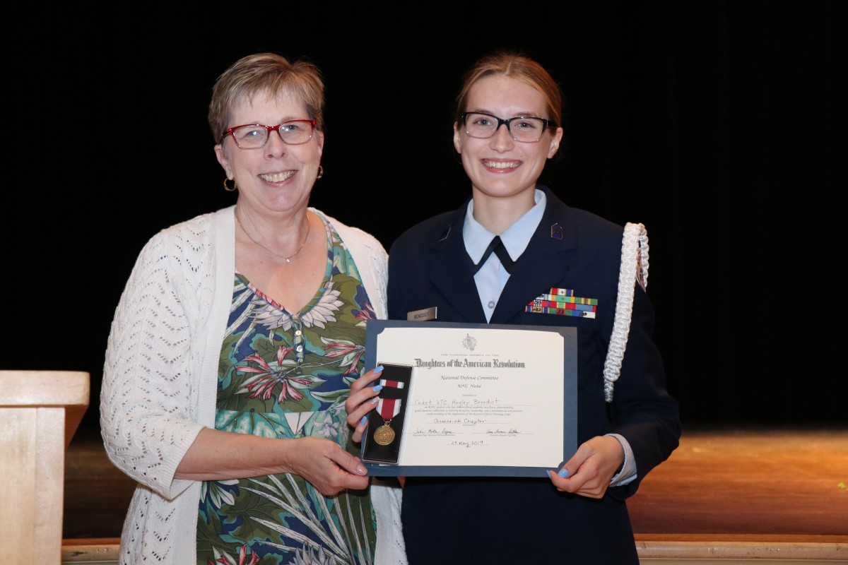 Students pose with their award.