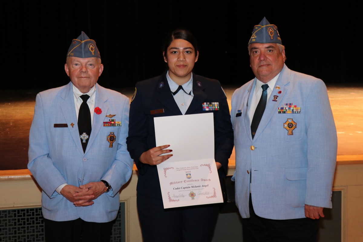 Students pose with their award.