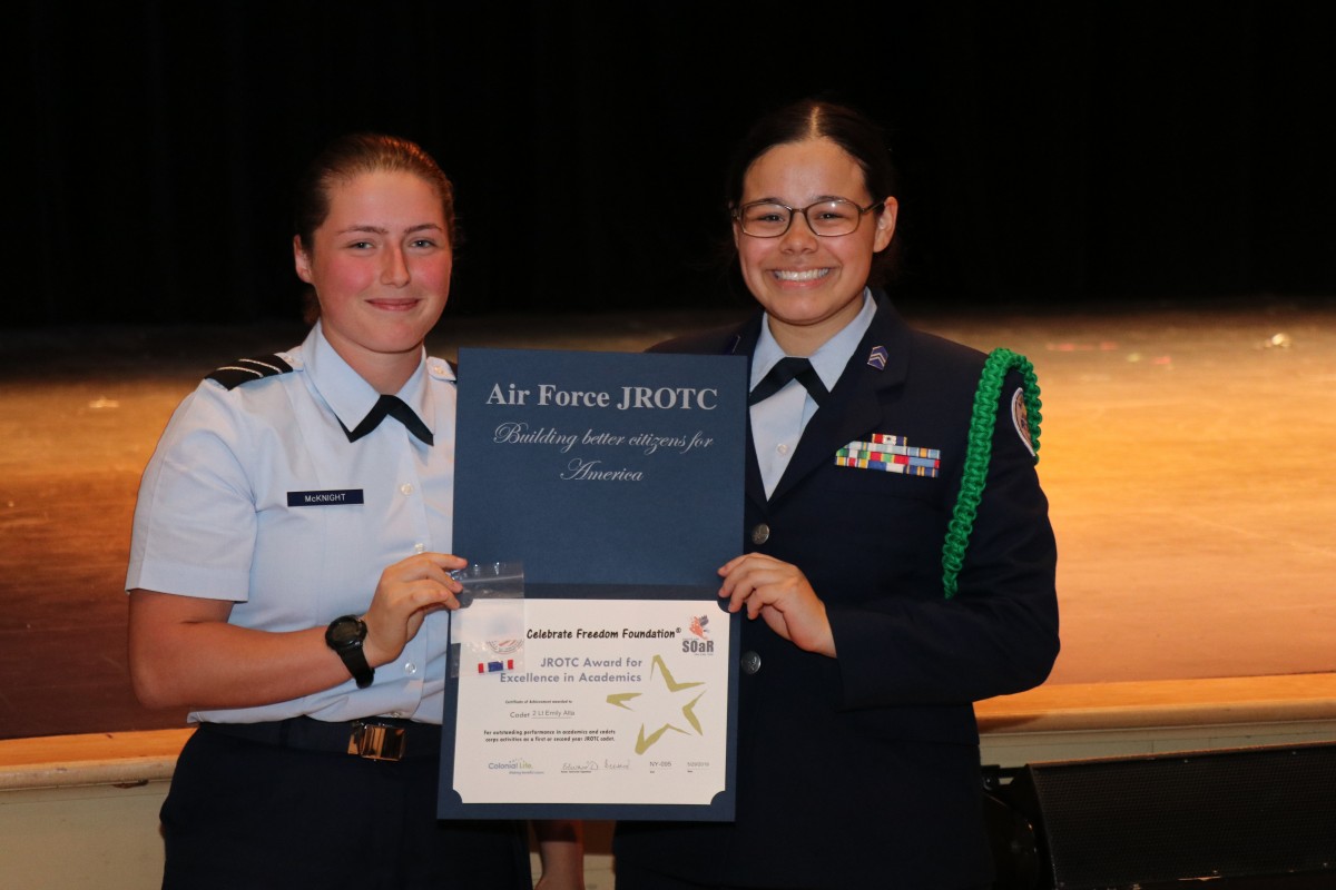 Students pose with their award.