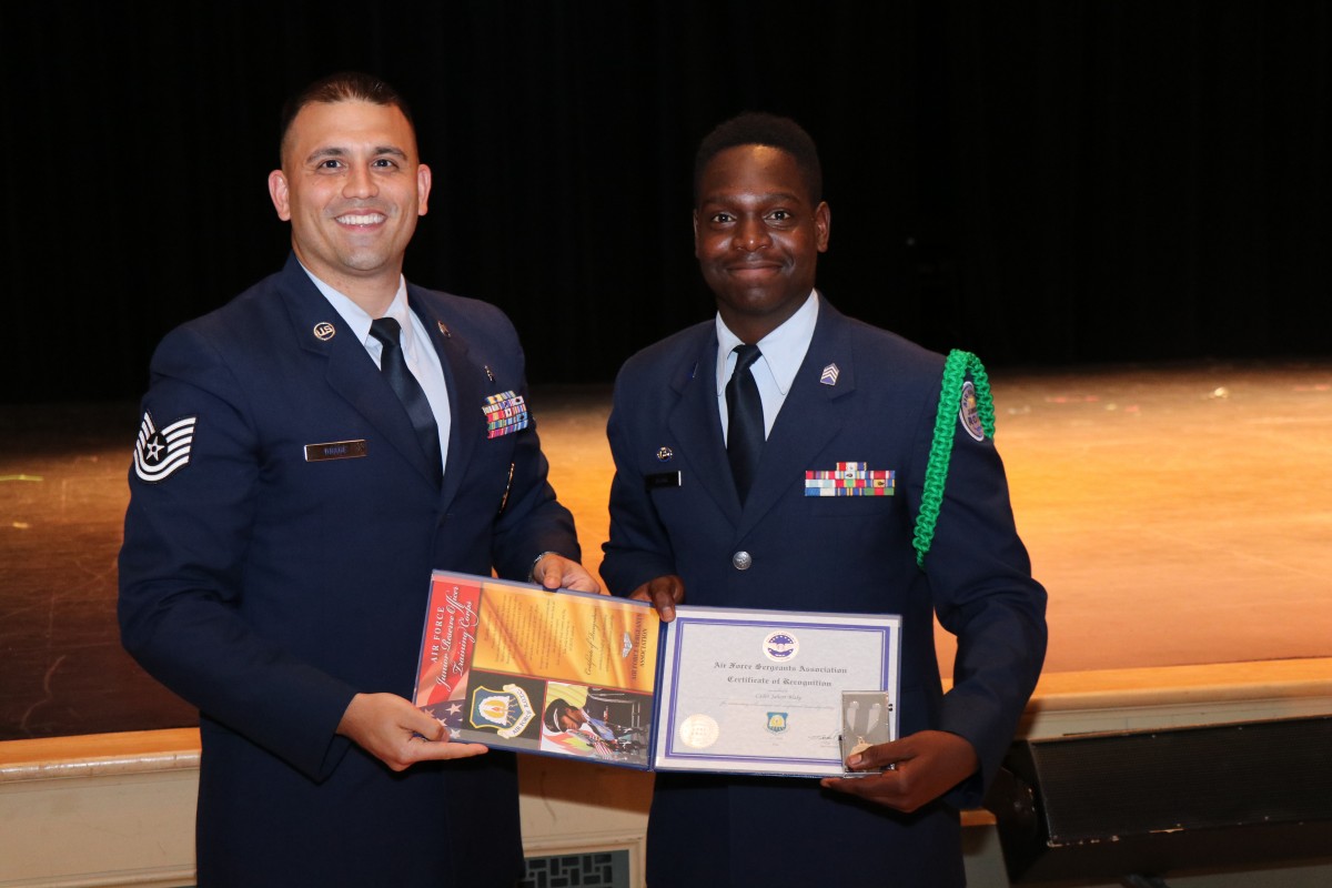 Students pose with their award.