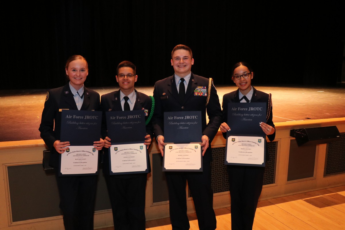 Students pose with their award.