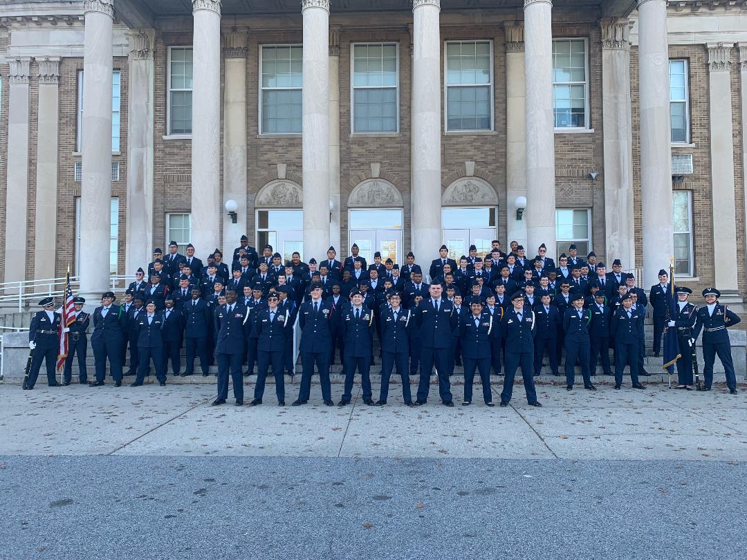 NFA AJROTC poses for a photo in front of NFA.