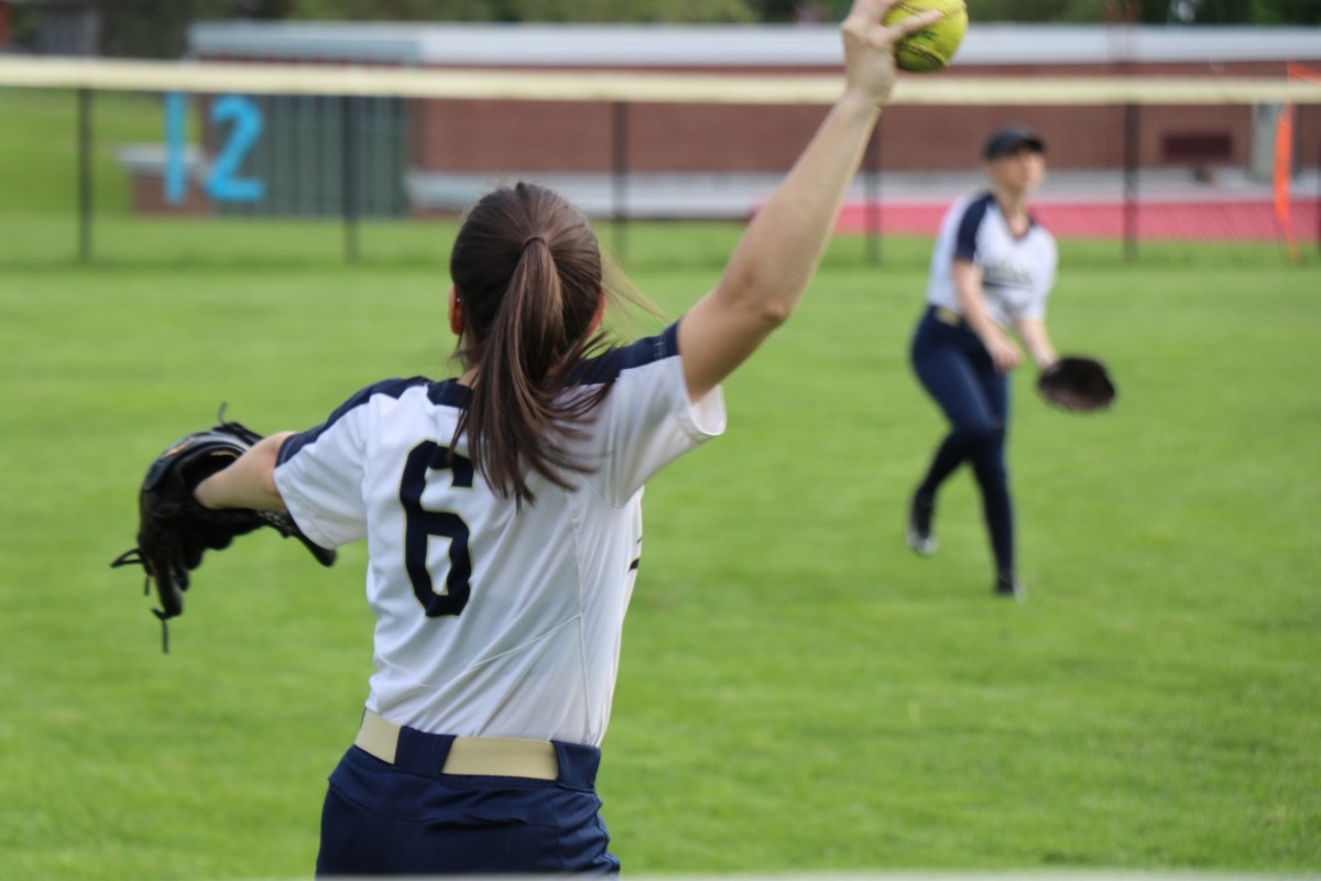 NFA player warming up in the field.