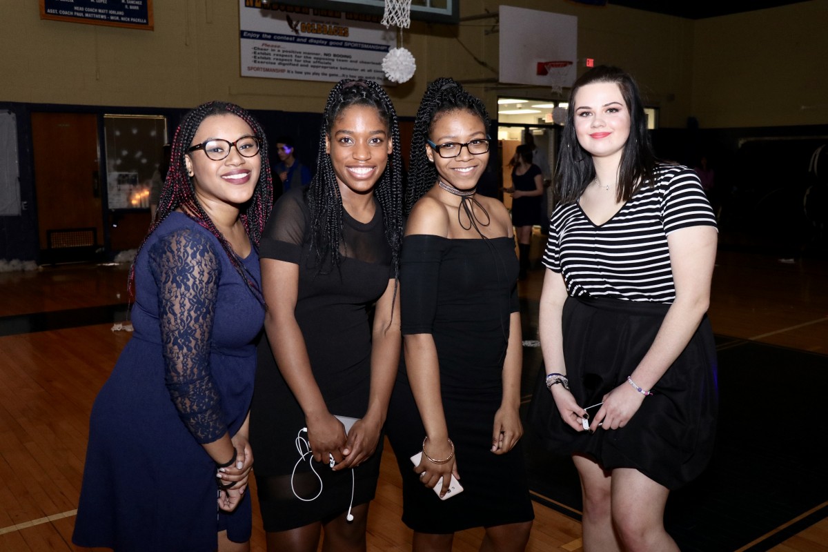 Students pose for photos