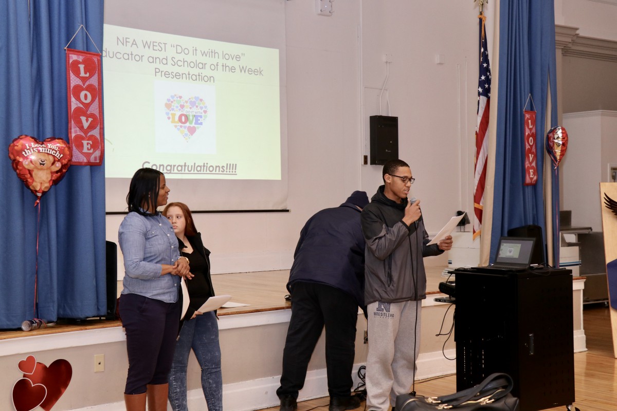 Student, Darius announcing the award