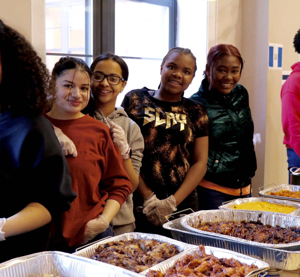 Students serve each other for International Celebration