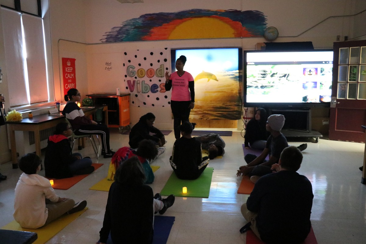 Ms. Stukes explains the purpose of the room to the scholars.