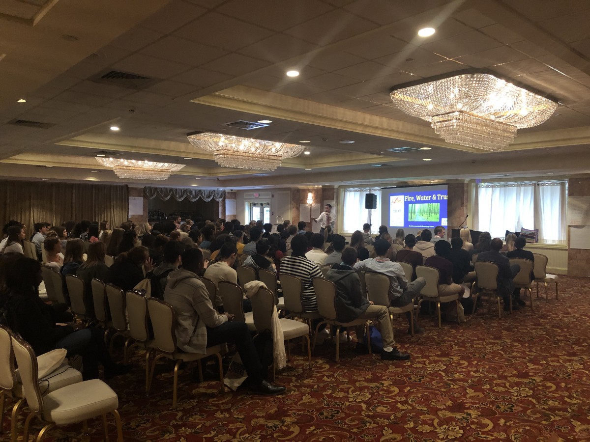 Participants watching a presentation.