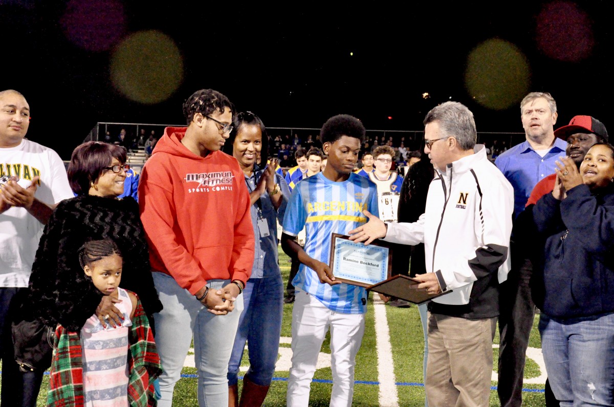 Students from NFA West accept recognition for work they do in the community