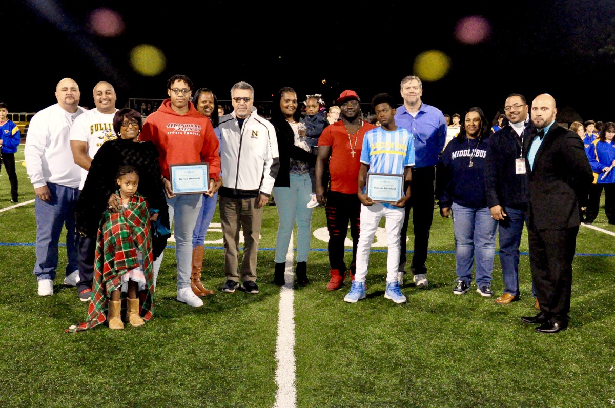 Students from NFA West accept recognition for work they do in the community