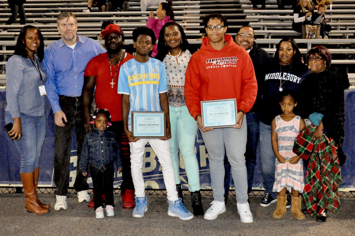 Students from NFA West accept recognition for work they do in the community