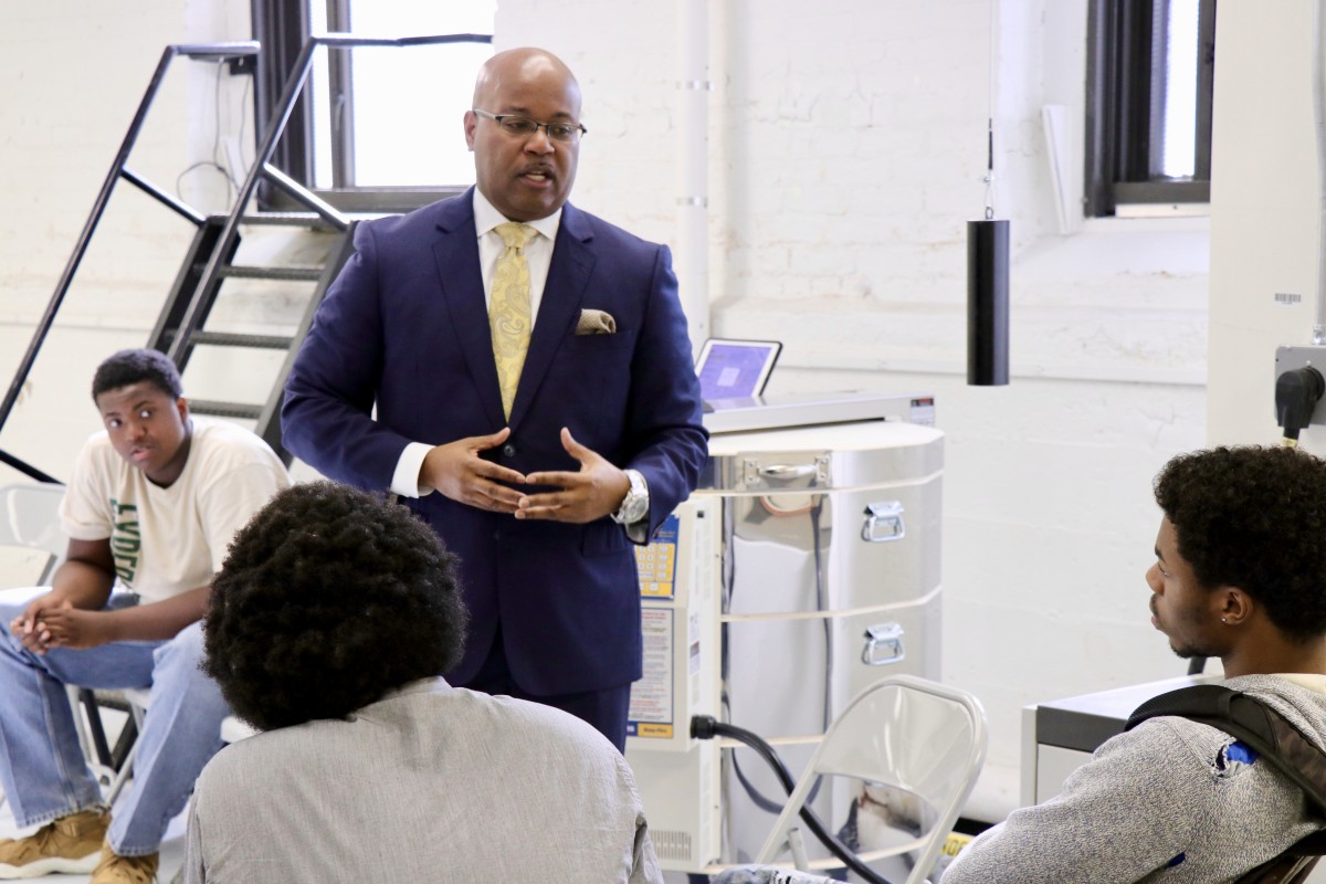 Board member, Mr. Howard speaks to  NFA West’s Young Men’s Group Mentoring Program