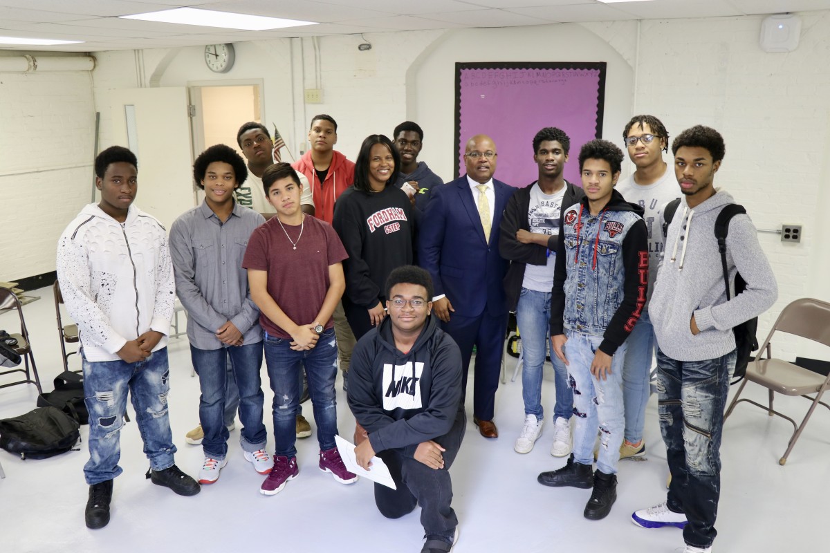 Members of NFA West’s Young Men’s Group Mentoring Program stand with Mr. Howard and School Counselor, Ms. Stukes