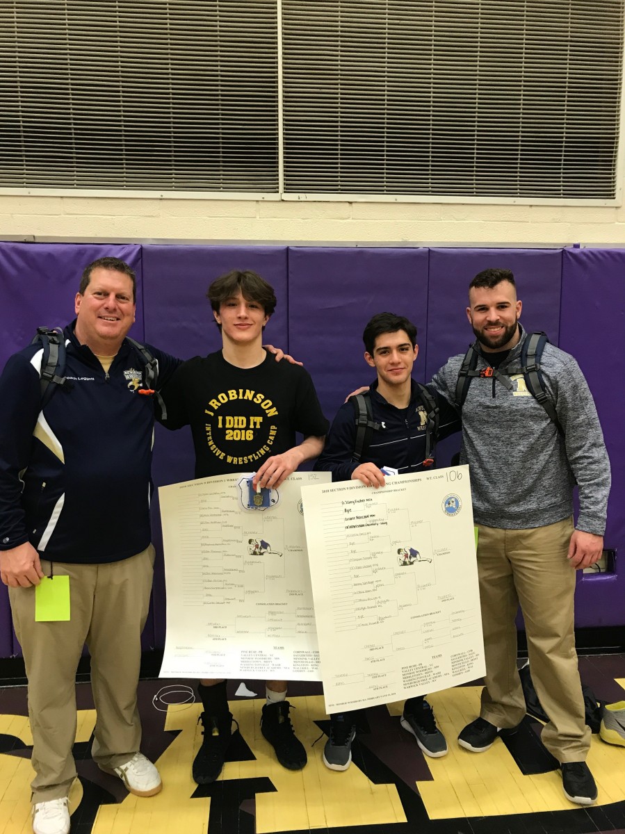 Coaches and Wrestlers pose for photo