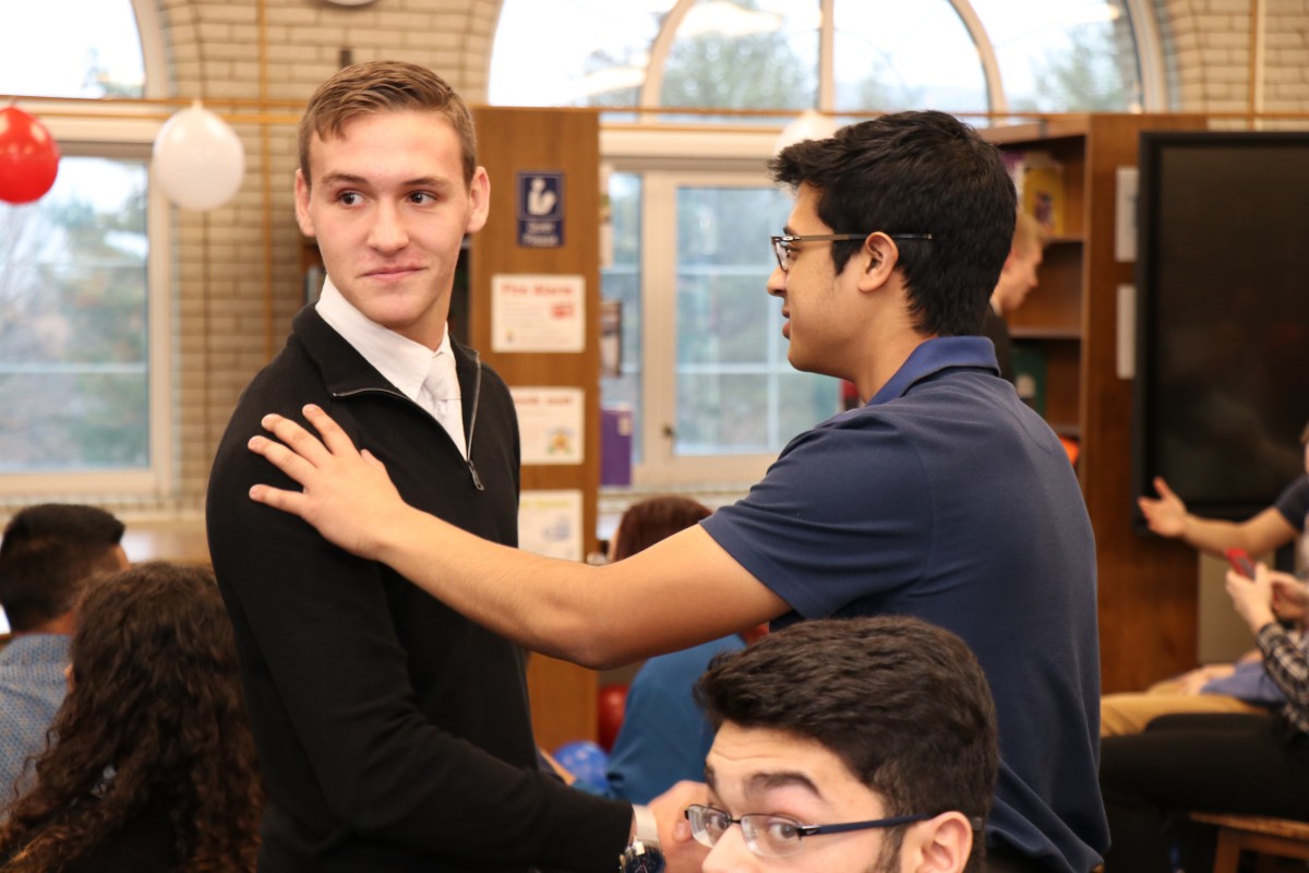 Student campaigns for votes.