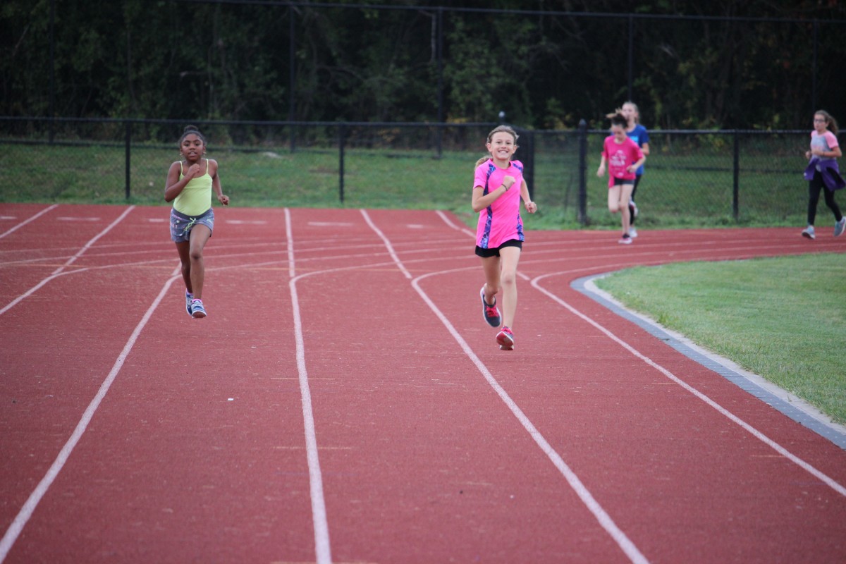 Girls running on track 2